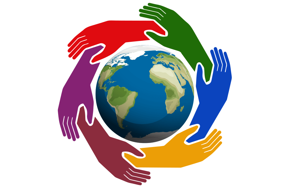 Different colored hands reaching around globe
