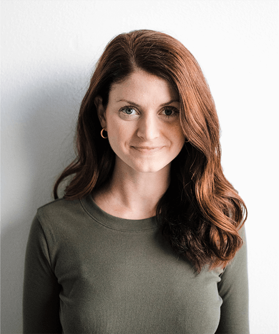 Woman smiling in green shirt