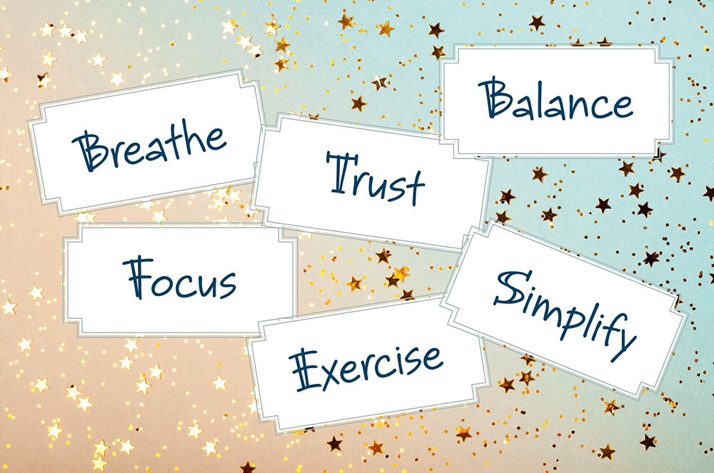 The words breathe, focus, trust, balance, exercise, and simplify written out with gold stars in the background