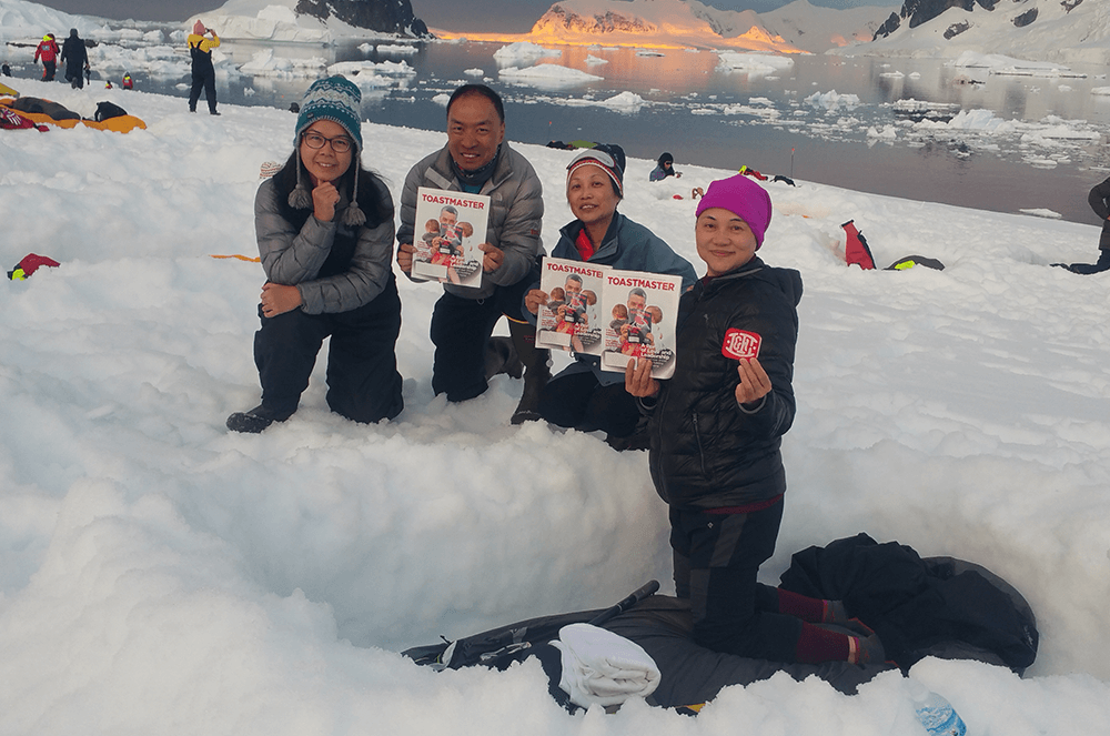 Ten Toastmasters left the comfort of their homes in Hong Kong to make camp in the Errera Channel on Danco Island, Antarctica. They all hail from different clubs in District 89 and had unanimously decided the vacation destination. After the 18-day Antarctica tour, some members stayed behind to tour South America for two months, even visiting the only English-speaking Toastmasters club in Argentina. The four members pictured had just shoveled snow to make a bed for the night despite frigid temperatures. Pictured from left to right: Karen Chow of Victoria Toastmasters, Manfred Leung of Wayfoong Toastmasters, Susan Lau of Mandarin Toastmasters Club of Hong Kong and Esther Lee from Hong Kong Achievers club.