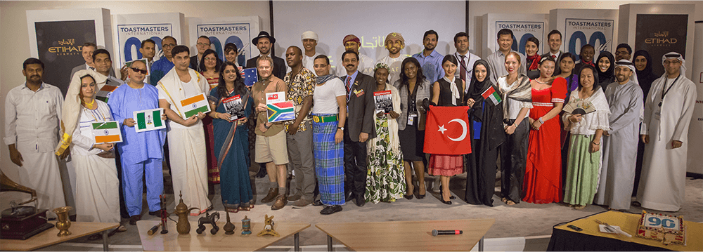 Members of Etihad Airways Toastmasters club of Abu Dhabi, United Arab Emirates, celebrate Toastmasters’ 90th anniversary with an 1930s theme. Attendees wore 1930s traditional attire for their respective countries, including Arabia, India, Philippines, the United Kingdom, South Africa, Zimbabwe, Turkey, Nigeria, and Australia. 