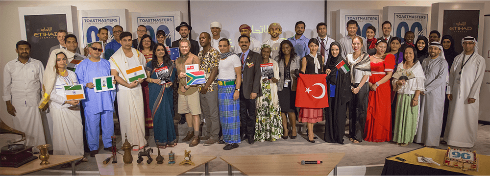Members of Etihad Airways Toastmasters club of Abu Dhabi, United Arab Emirates, celebrate Toastmasters’ 90th anniversary with an 1930s theme. Attendees wore 1930s traditional attire for their respective countries, including Arabia, India, Philippines, the United Kingdom, South Africa, Zimbabwe, Turkey, Nigeria, and Australia.