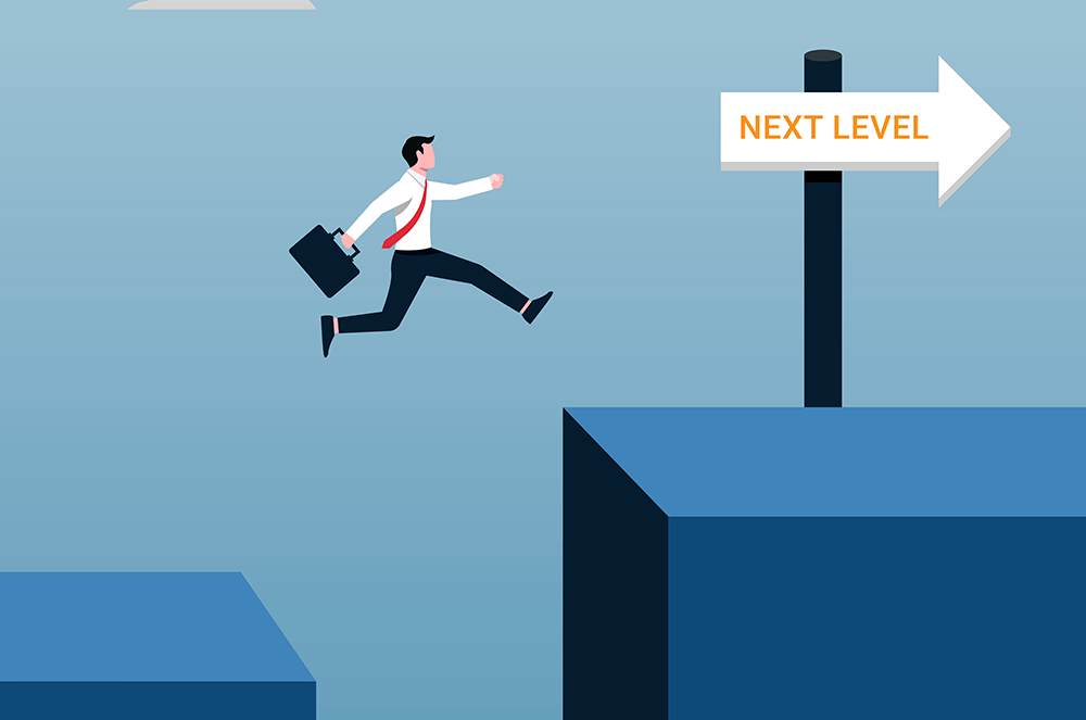 Cartoon man in business attire holding suitcase while leaping to blue block with white arrow saying Next Level
