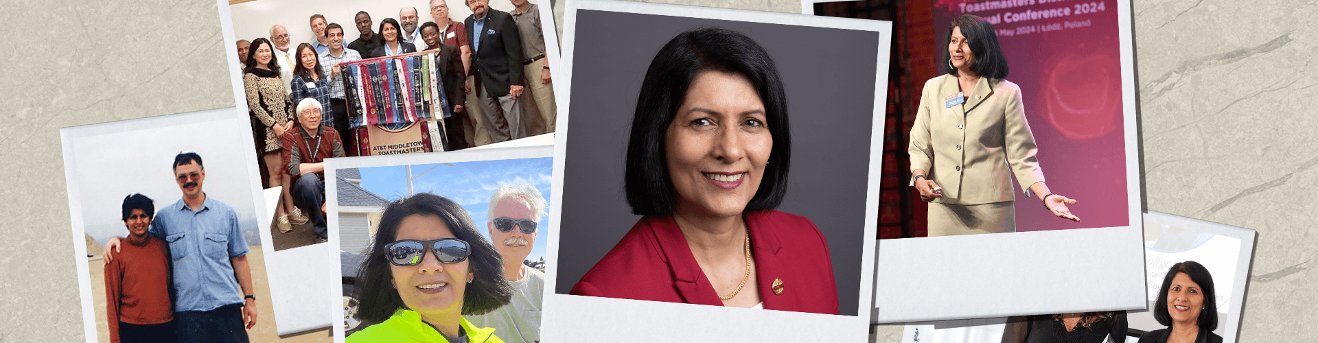 Toastmasters International President Radhi Spear in red suit jacket smiling