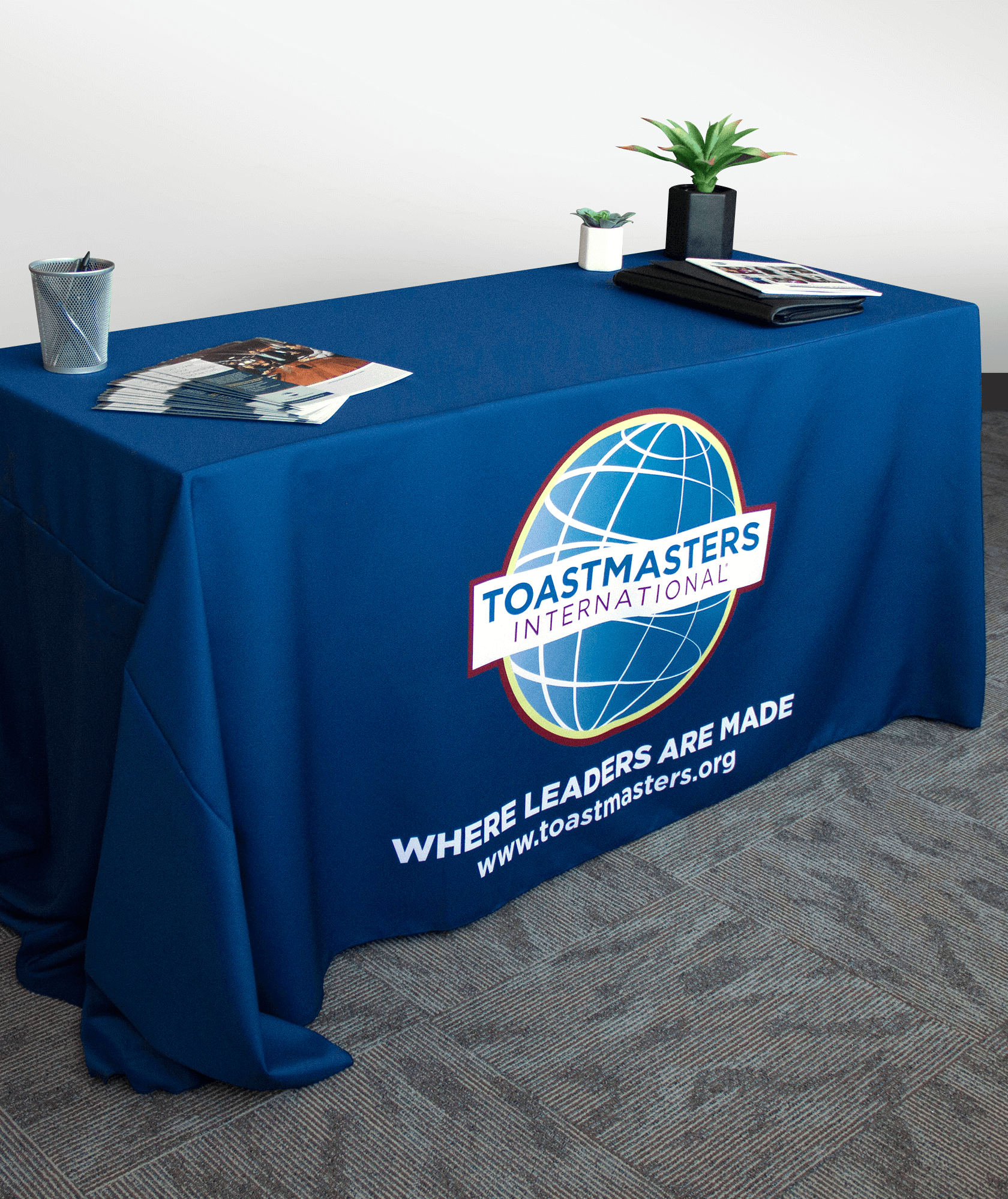 Navy tablecloth with color logo, tagline and website