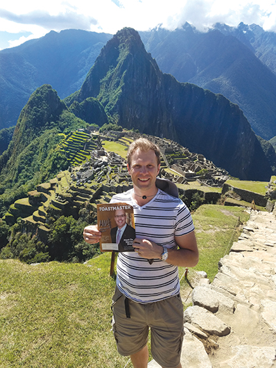 Victor Gichun, CC, from San Jose, California, stands before the Incan citadel at Machu Picchu, Peru.