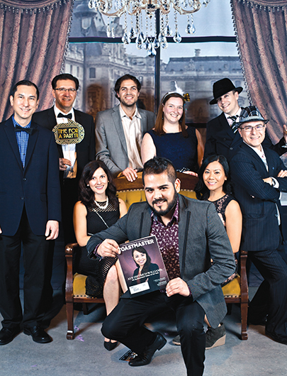 Moneris Toastmasters dress in the style of the Roaring Twenties at their holiday party in Liberty Grand entertainment complex, Toronto, Canada.