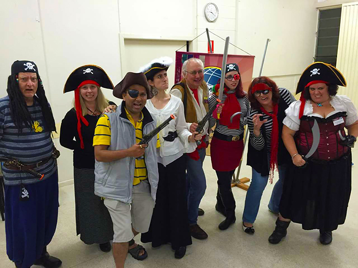 Members of the Pines Toastmasters club in Queensland, Australia, dress for a pirate-themed meeting.