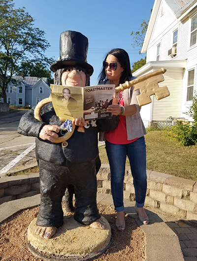 Jean Rossett, from Franksville, Wisconsin, poses with a Mount Horeb Troll, in Mount Horeb, Wisconsin, the “troll capital of the world.”