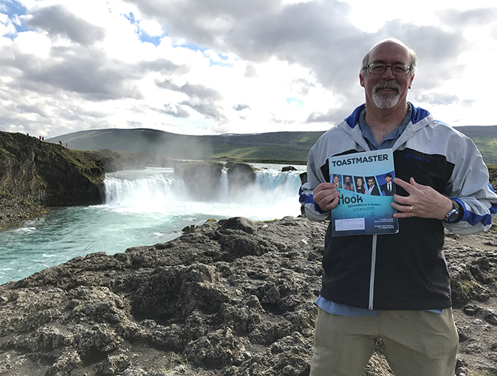 Ron Maroko, DTM, PDG, from Redondo Beach, California, enjoys the view at Godafoss Waterfall in Iceland. 