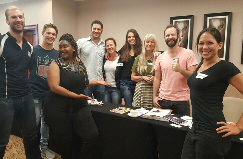 Members and guests pose at the open house for the ToastED club in Cape Town, South Africa.