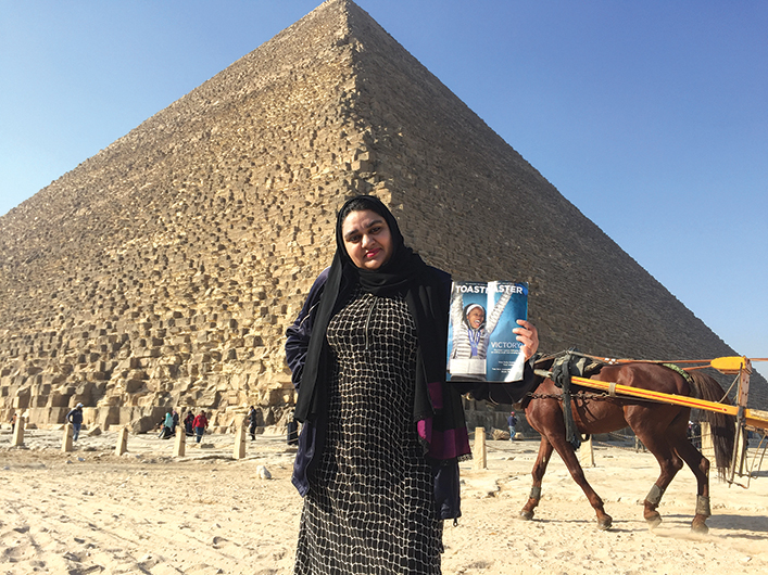 Memona Abuobaida, from East Riffa, Bahrain, poses in front of the Great Pyramid of Giza in Cairo, Egypt.
