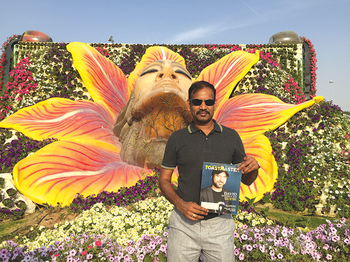 Ravi Patil, CC, CL, from Doha, Qatar, poses in the Dubai Miracle Garden, a flower garden located in the United Arab Emirates.