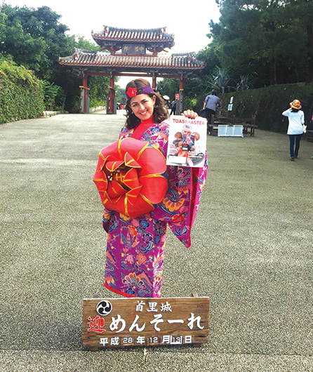 Chava lilove, from Pittsburgh, Pennsylvania, stands at Shureimon gate in Okinawa, Japan.