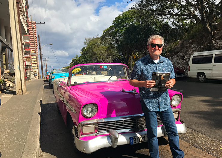Bruce Ridge, ACG, CL, from Prairie Village, Kansas, enjoys the classic cars in Havana, Cuba.