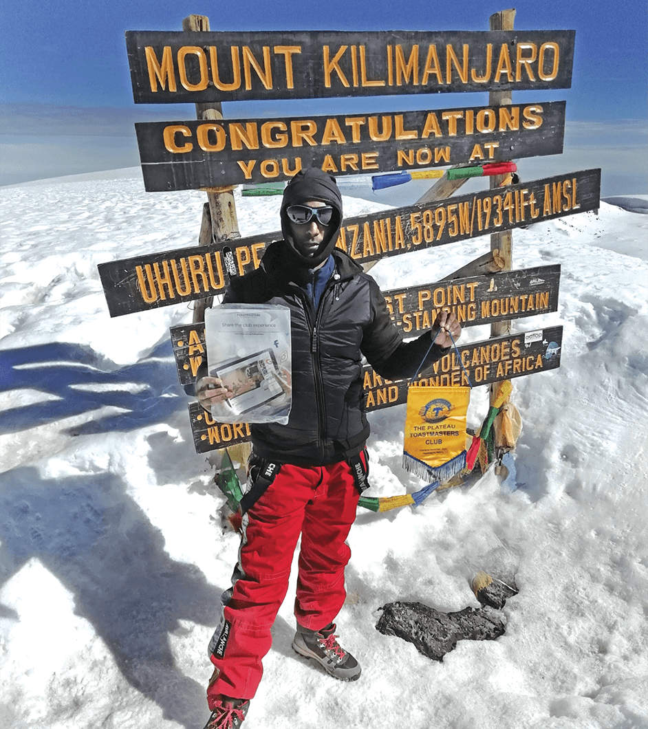 Nadarajen MooroogaN,
of Quatre Bornes, Mauritius, celebrates reaching the 5,895-meter/19,341-foot summit of Uhuru Peak, Mount Kilimanjaro, Tanzania.