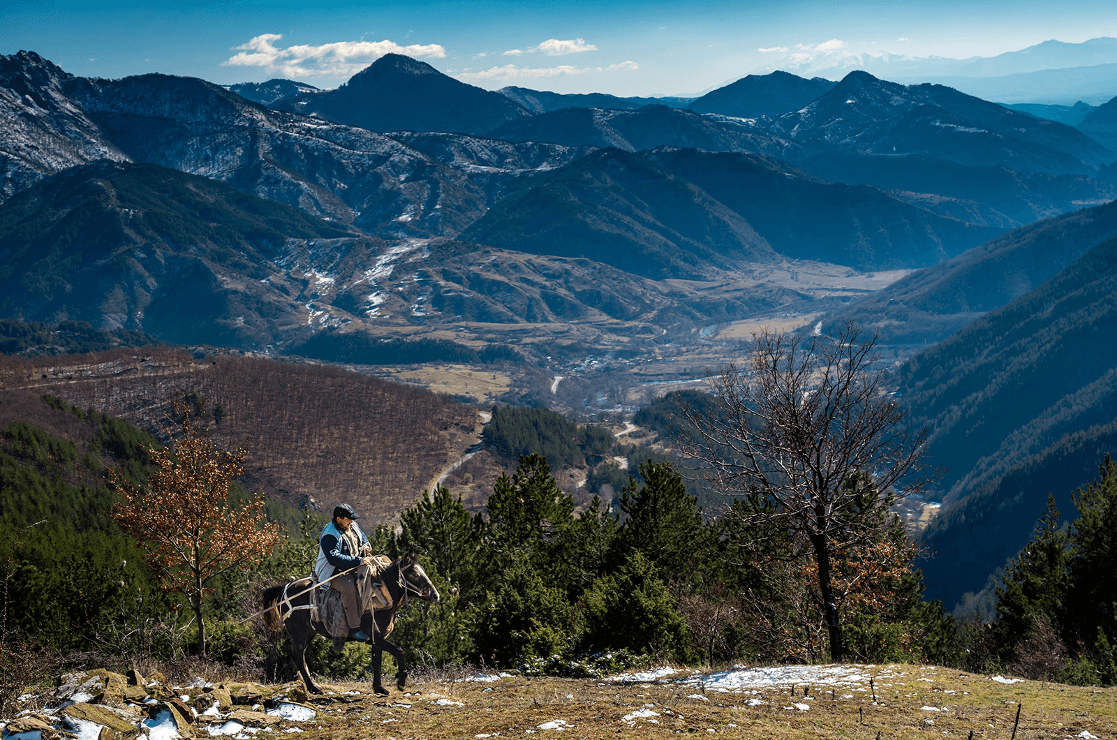 A man rides a horse in Bulgaria. Photo Credit: AUBG Professor Jeffery Nilsen