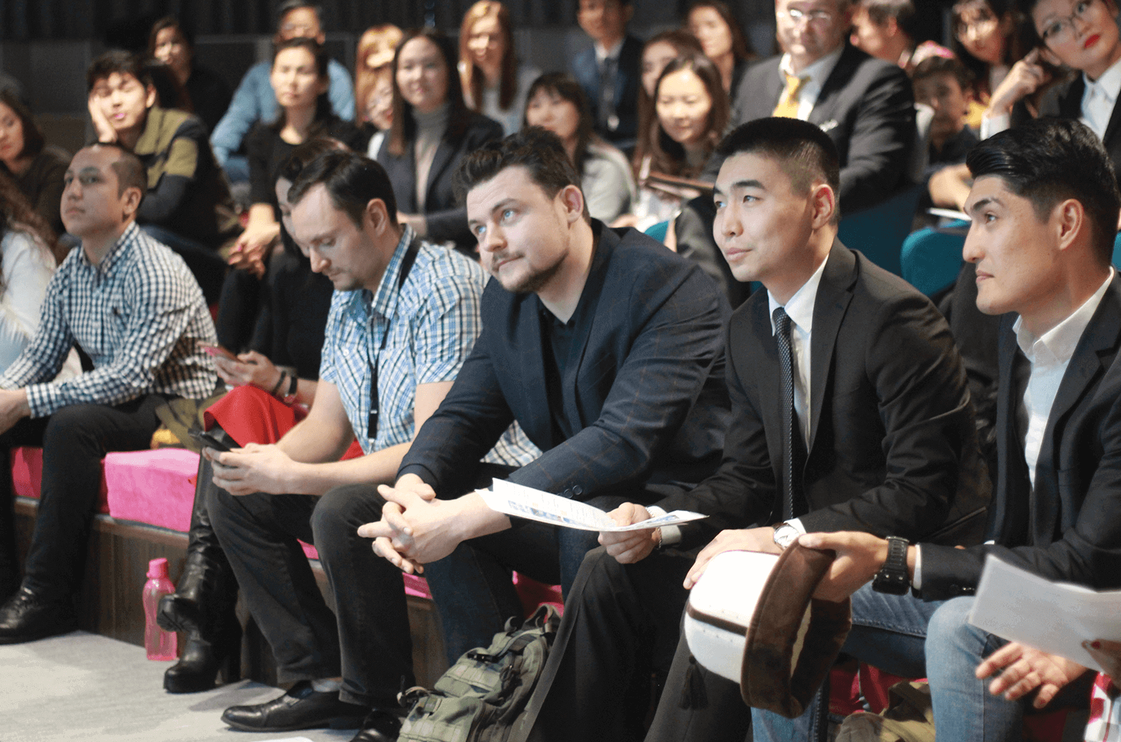 Contestants Sergey Saprykin, Vladislav Son and Nursultan Sulaimanov listen to a fellow competitor’s speech. Photo Credit: Gulnar Aden