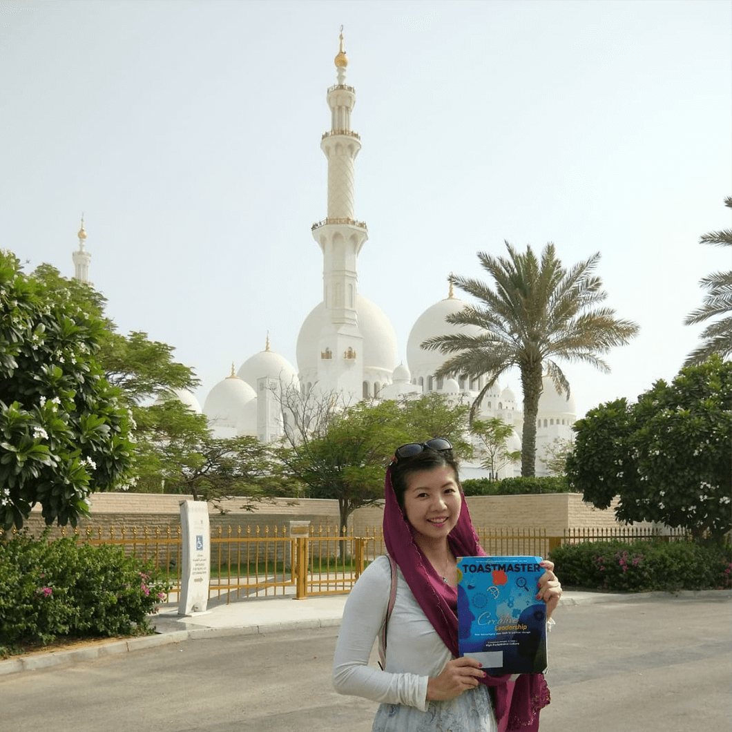 Xinni Chen, CC, CL, of Singapore, in front of the Grand Mosque, one of the largest mosques in the United Arab Emirates, in the capital city of Abu Dhabi.