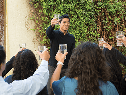 Man toasting a crowd