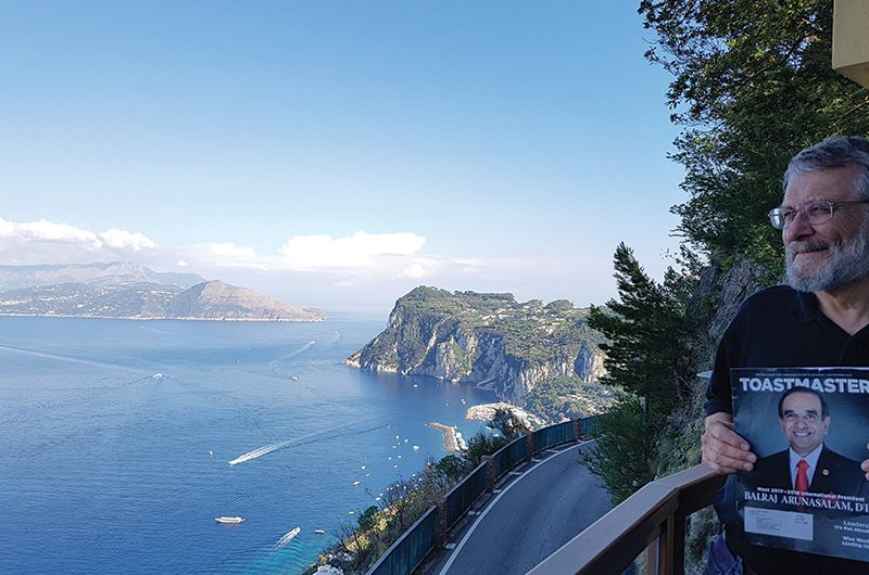 Greg Stott, ACG, CL, from Sudbury, Ontario, Canada, takes in the view from his balcony on top of the Isle of Capri, off the west coast of Italy.