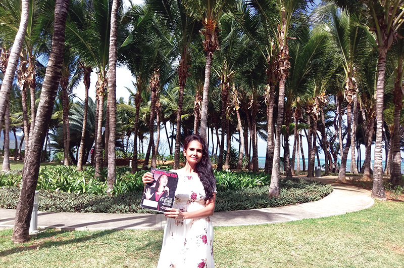 Bandana Jain, from Dubai, United Arab Emirates, enjoys the swaying coconut trees and breezy beaches in Mauritius.