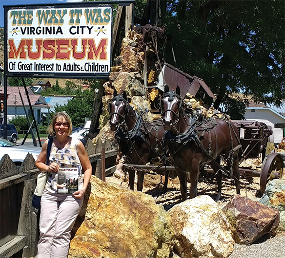Mary Jo Finchum, ACB, from Muscatine, Iowa, poses in front of the Virginia City Museum in Nevada. 