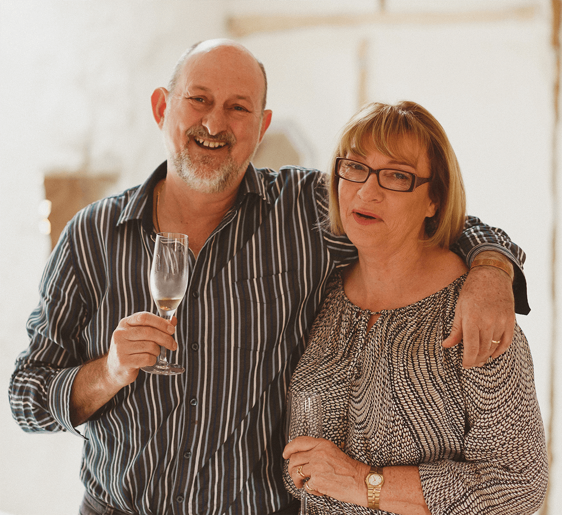 Peter and his wife, Violet, are captured during a candid moment.