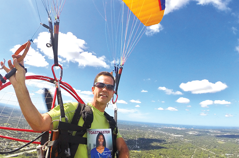 John Beiler, CC, flies a powered paraglider above his hometown of Sarasota, Florida.