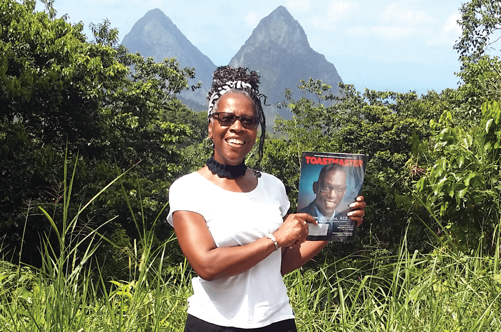 Ann Lawson, ACS, ALB, of Acworth, Georgia, poses in front of the volcanic peaks of the Pitons in Soufriere, St. Lucia.