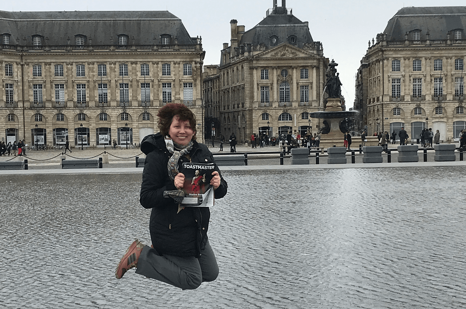 Elena Schwartz, of North Potomac, Maryland, jumps high in front of the Miroir d'eau (Water Mirror). The world's largest reflecting pool in Bordeaux, France, is just two centimeters deep. 