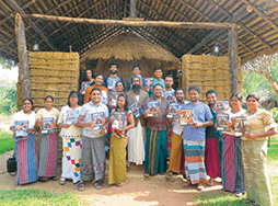 Toastmasters group pose in ancient village in Puranagama, Sri Lanka