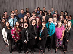 Toastmasters International World Headquarters Member Support staff posing in group photo