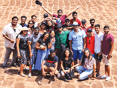 Group of Toastmasters members posing in Goa, India