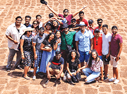 Group of Toastmasters members posing in Goa, India