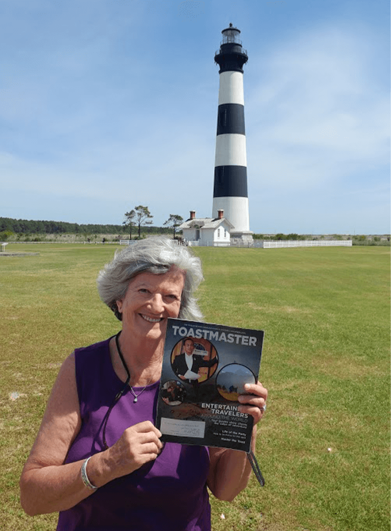 Carol Finley of Oak Ridge, Tennessee stands in front of the Bodie Island Lighthouse in Nags Head, North Carolina. 