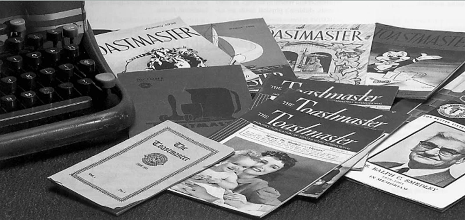 Vintage Toastmaster magazines next to typewriter