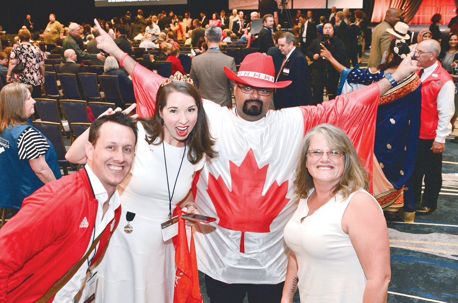 Canadian Toastmasters celebrate before Opening Ceremonies begin.