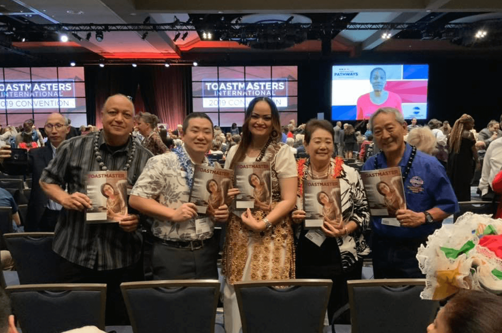 John Coleman, Kory Ikeda, Sepiuta Holakeituai, DTM, Gloria Shishido, DTM, and Nelson Nakagawa, all of Hawaii, represent District 49 at the Toastmasters International Convention in Denver, Colorado. 