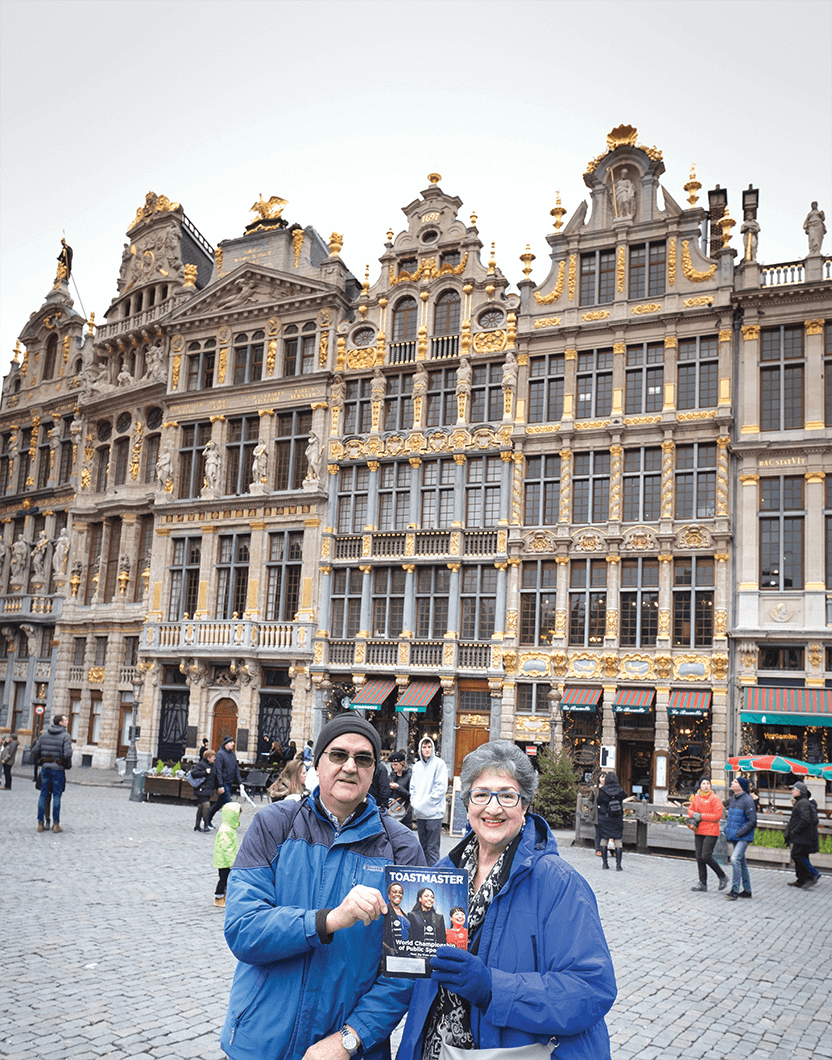 Distinguished Toastmasters Desi and Miriam Mora of Austin, Texas, visit Grote Markt, a town square in the heart of the old city quarter in Antwerp, Belgium.