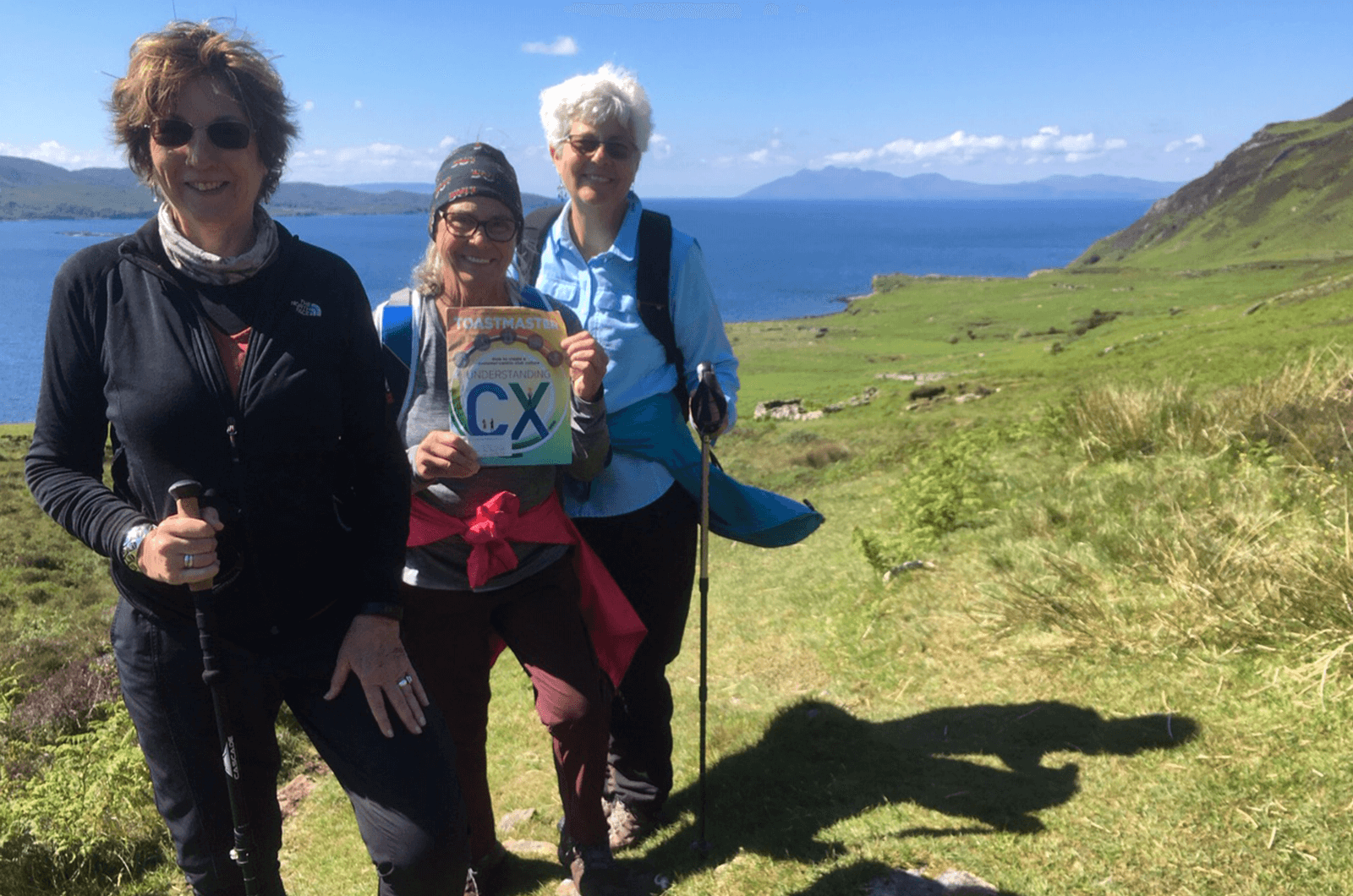 Marjorie Love, Lois Somohano, and Marguerite Smith of Vista, California, hike in Boreraig Clearance in Scotland.