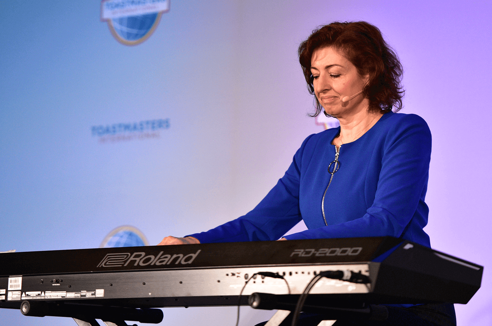 Yelena Balabanova onstage in blue dress