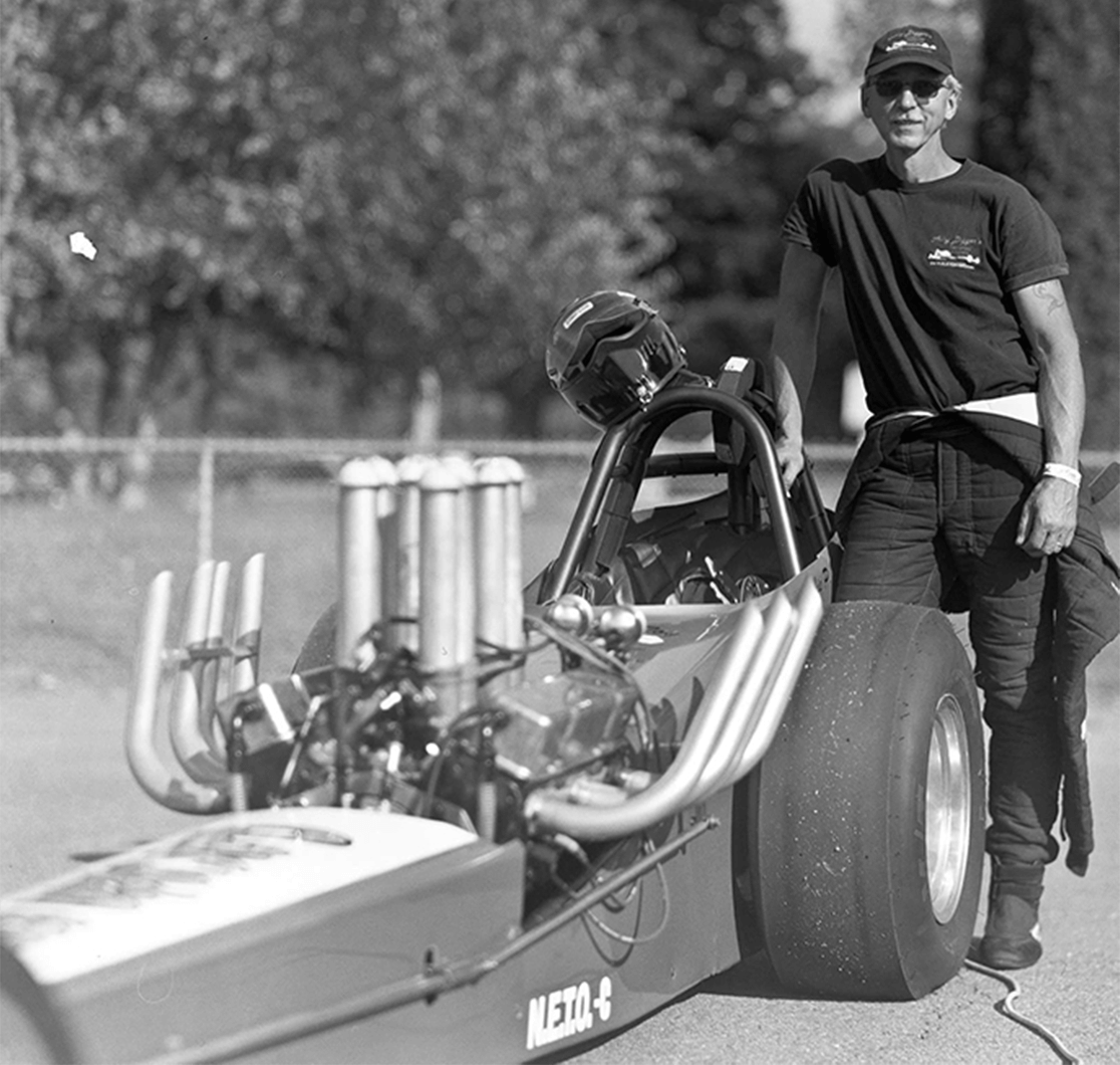 Richard Peck posing with his 1963 Front Engine Dragster.