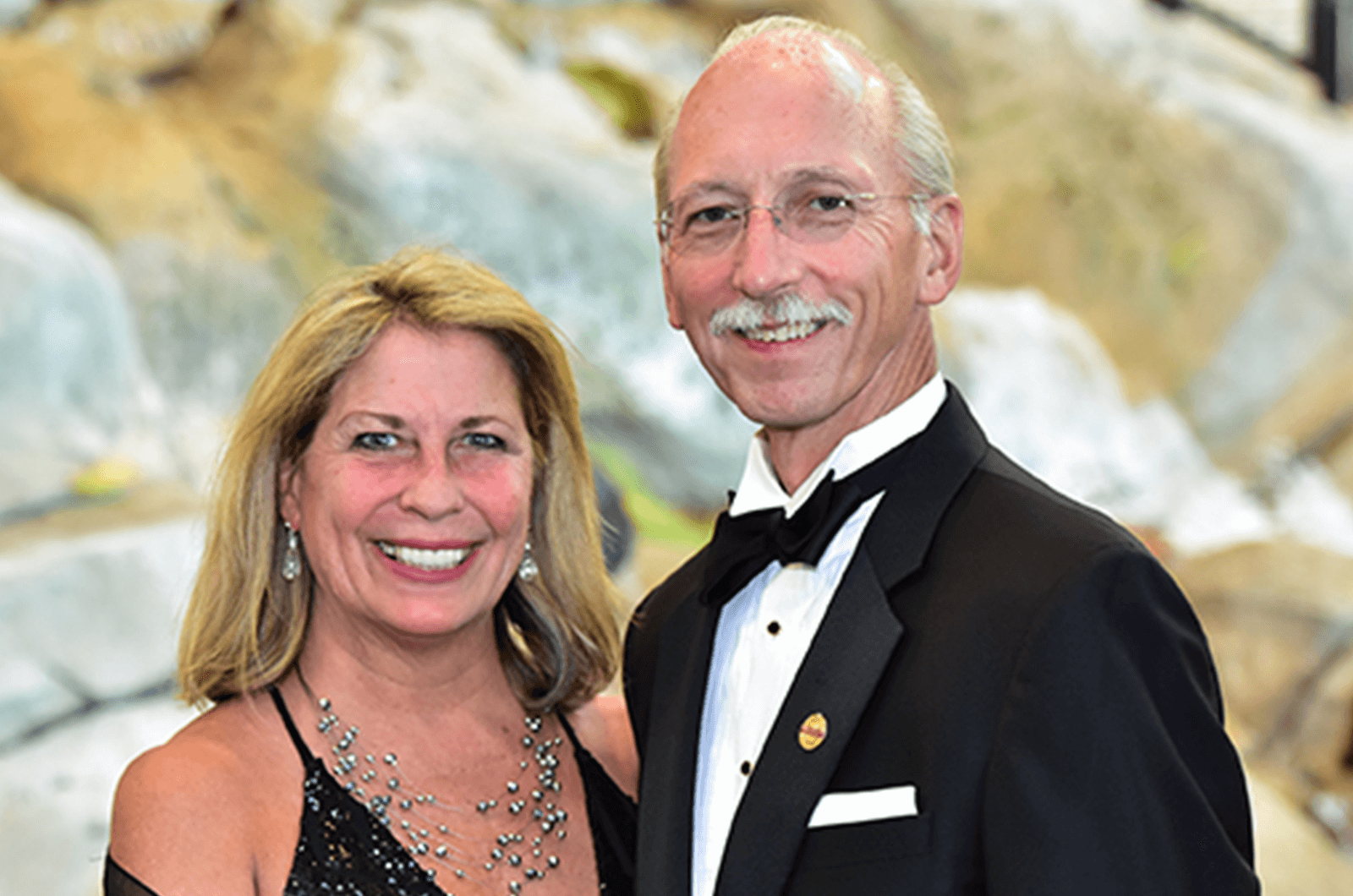 Bettyann Peck posing with husband Richard Peck.