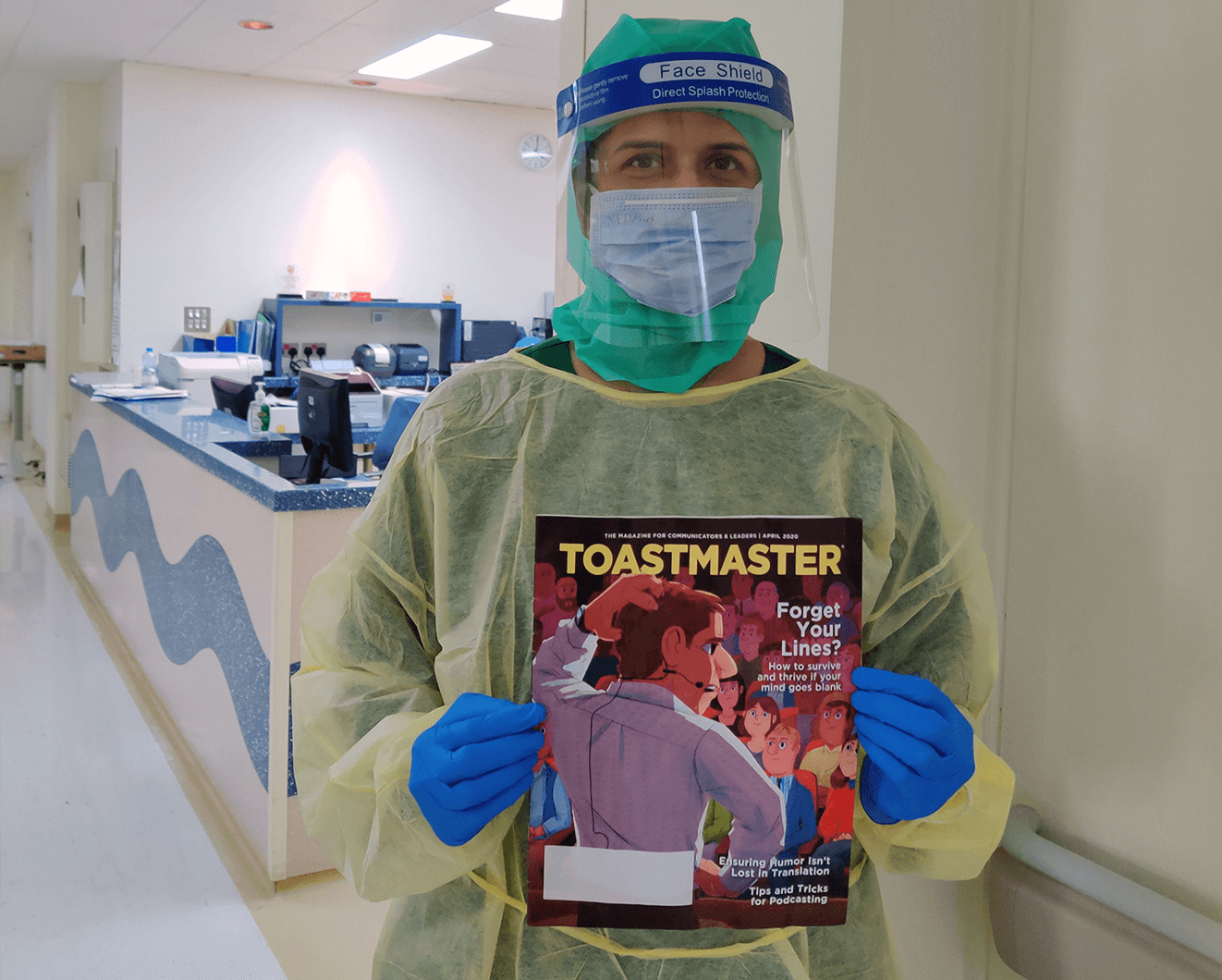Dr. Sonali Kodange of Muscat, Oman, takes a break with the Toastmaster while working in a hospital intensive care unit during the COVID-19 pandemic.