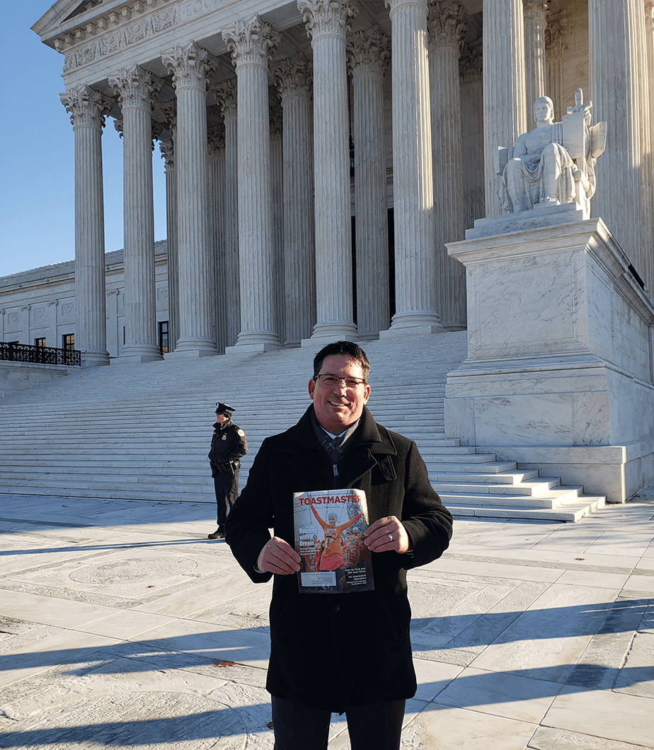 Andrew Osorno of Rockville, Maryland, stands outside the U.S. Supreme Court building in Washington, D.C.