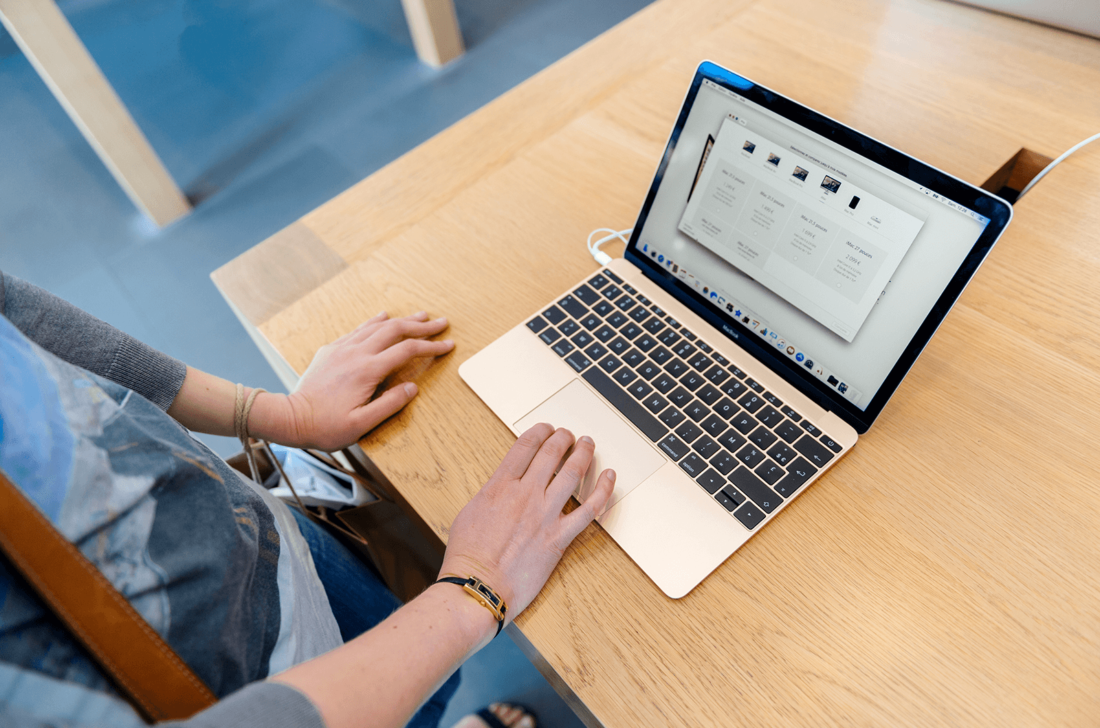 Person using laptop on a desk