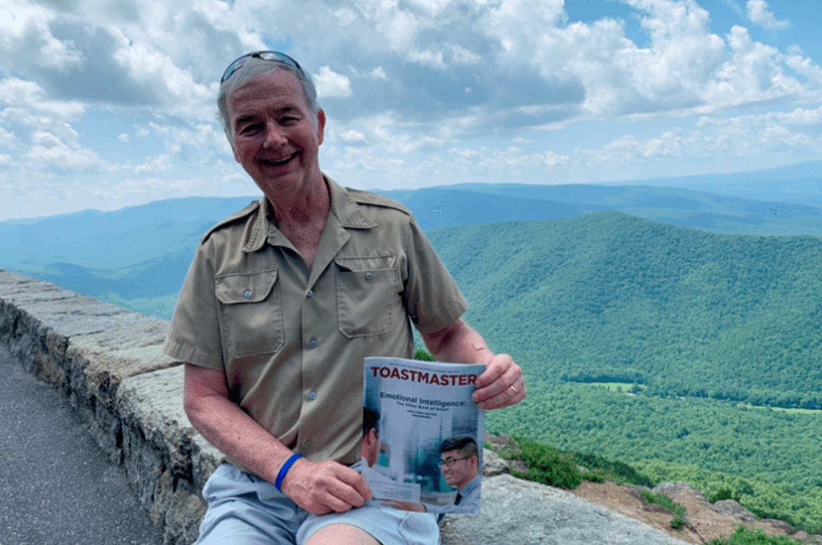 Jeffrey Anderson, DTM, of Virginia Beach, Virginia, sits at the top of the Blue Ridge Parkway—a road that runs 469 miles through Virginia and North Carolina. Behind Anderson is the Shenandoah Valley, near Lyndhurst, Virginia. 