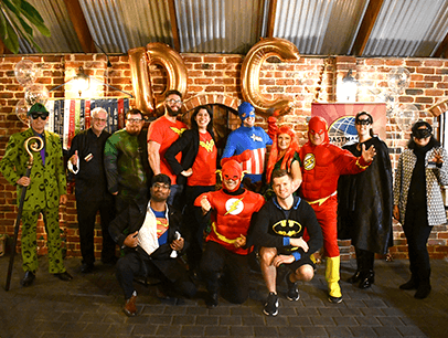 People dressed up in superhero costumes 