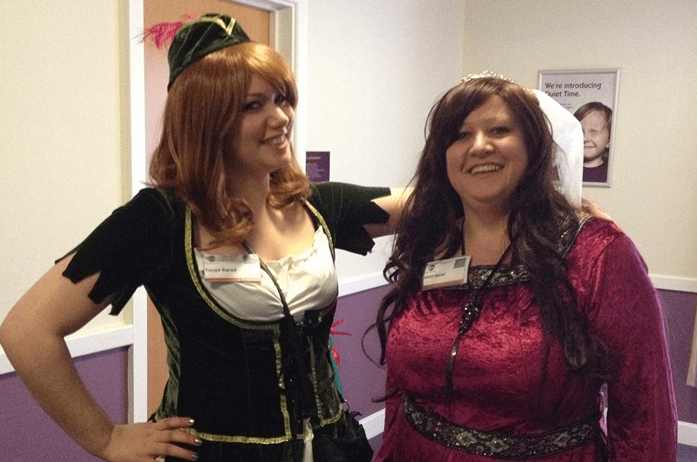 Tanya and her mother, Mish, dress up in costume for a Robin Hood-themed conference.
